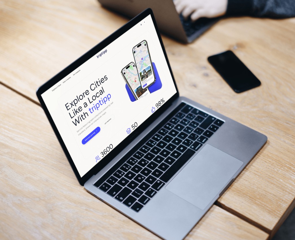 MacBook mockup with triptipp landing page